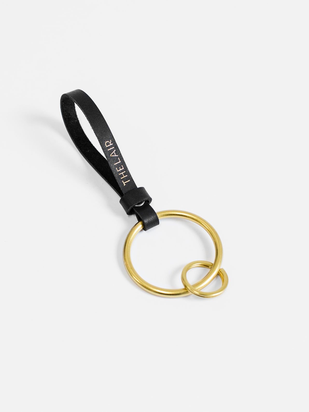 The Lair Loop Keyring Brass