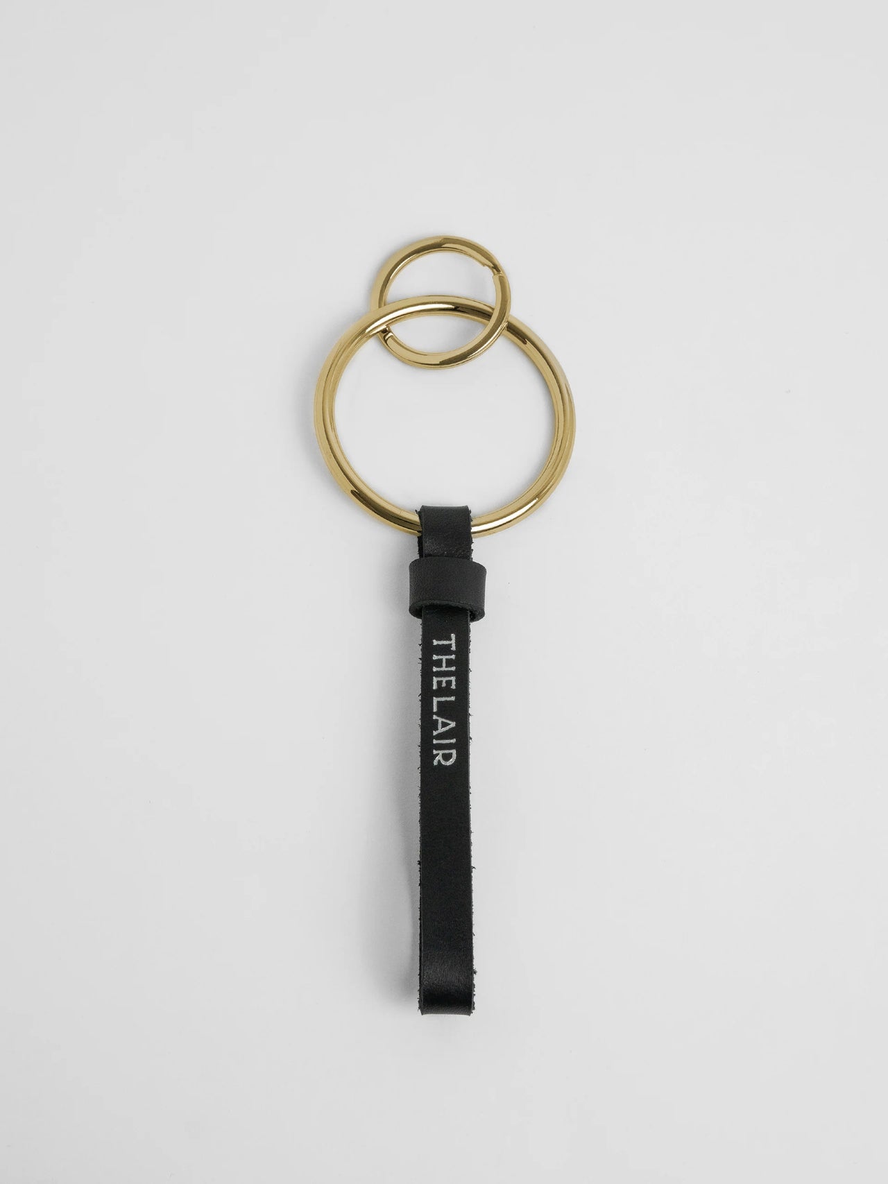 The Lair Loop Keyring Brass