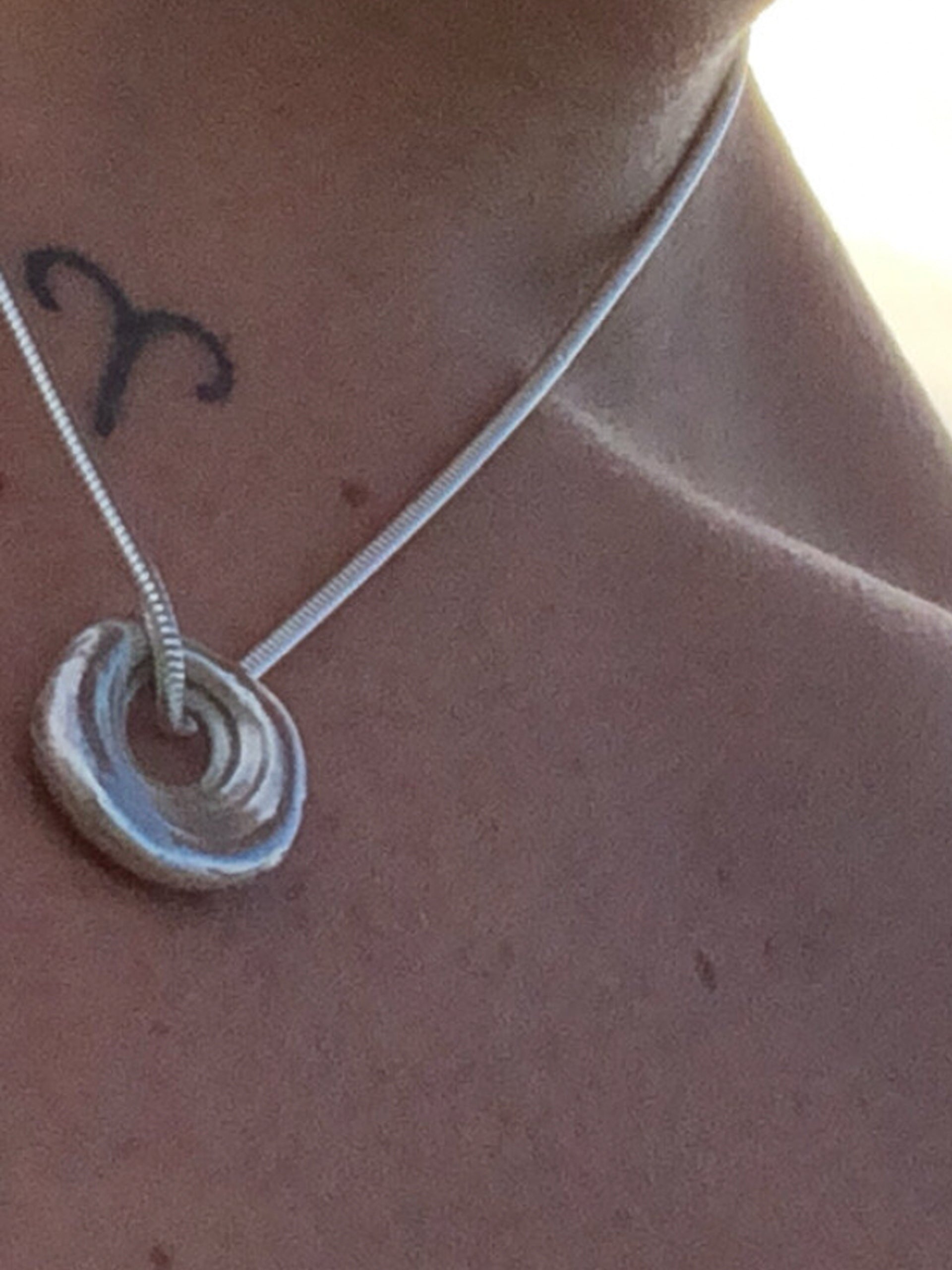 the-lair-P.NINA-Planetary-Spiral-Shell-Necklace-Silver